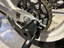Vorschaubild Racemodeparts Kettenspanner / Achsversteller mit Achsprotektor (Set)